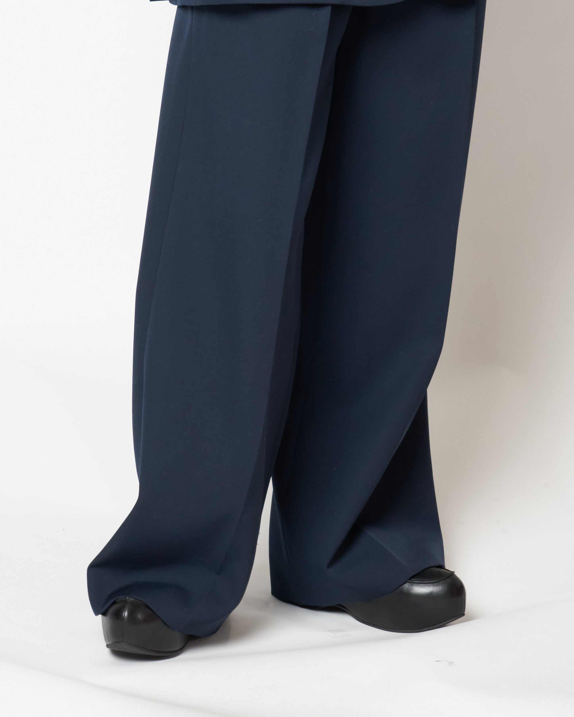 ISPARTA - WIDE SILHOUETTE WOOL TUCKED TROUSERS