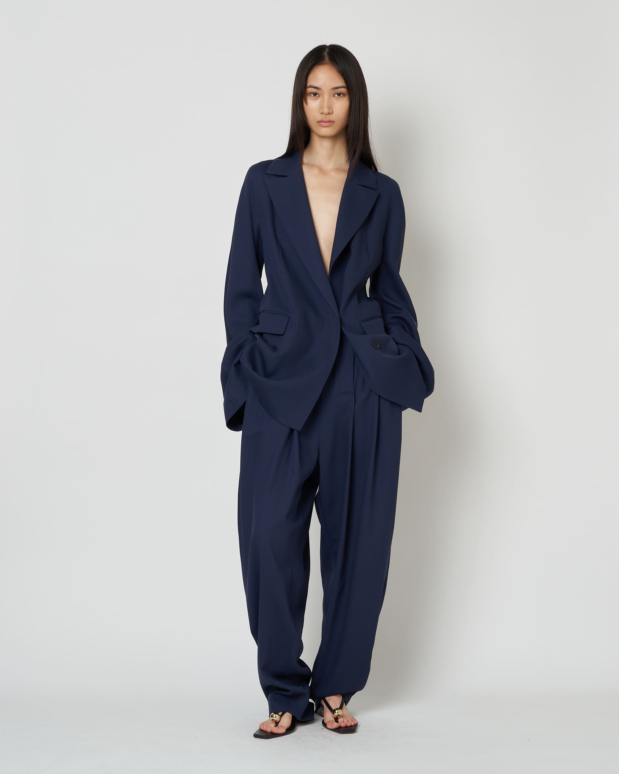 ISPARTA - WIDE SILHOUETTE WOOL TUCKED TROUSERS