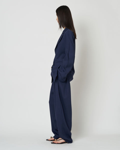 ISPARTA - WIDE SILHOUETTE WOOL TUCKED TROUSERS