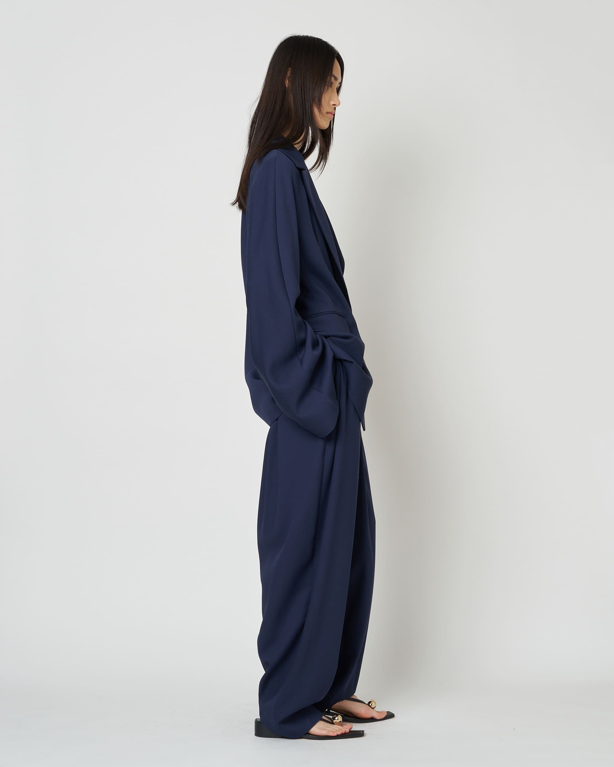 ISPARTA - WIDE SILHOUETTE WOOL TUCKED TROUSERS